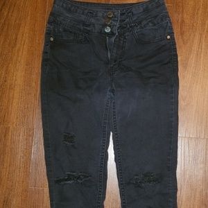 High waisted, black distressed jeans